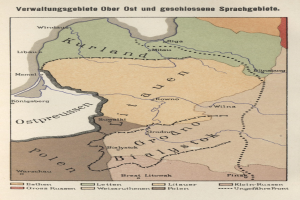 Plakat mit einer Karte des Deutschen Reichs in der Mitte, umgeben von Text und darstellend das territoriale Ausmaß des britischen Empire mit Städten, Dörfern, Flüssen und geografischen Merkmalen.