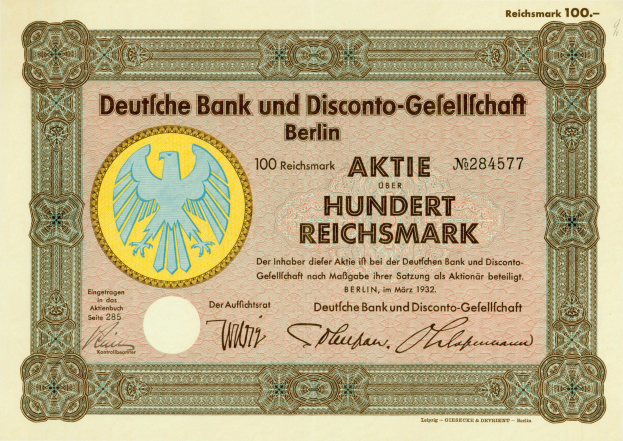 Eine alte deutsche Banknote mit einer Vogeldarstellung und der Aufschrift "Deutsche Bank und Disconto-Gefellichaft Berlin"
