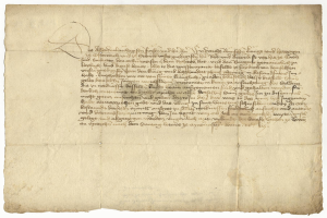 Ein vergilbtes, altes Stück Papier mit sauberer, lesbarer Schreibschrift, das mutmaßlich ein Brief des deutschen Finanzministers an seine Frau ist.